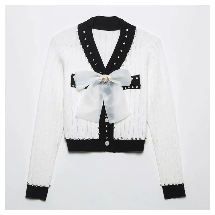 Xiaoxiangfeng V-neck heavy industry rivet bow knit cardigan  7294